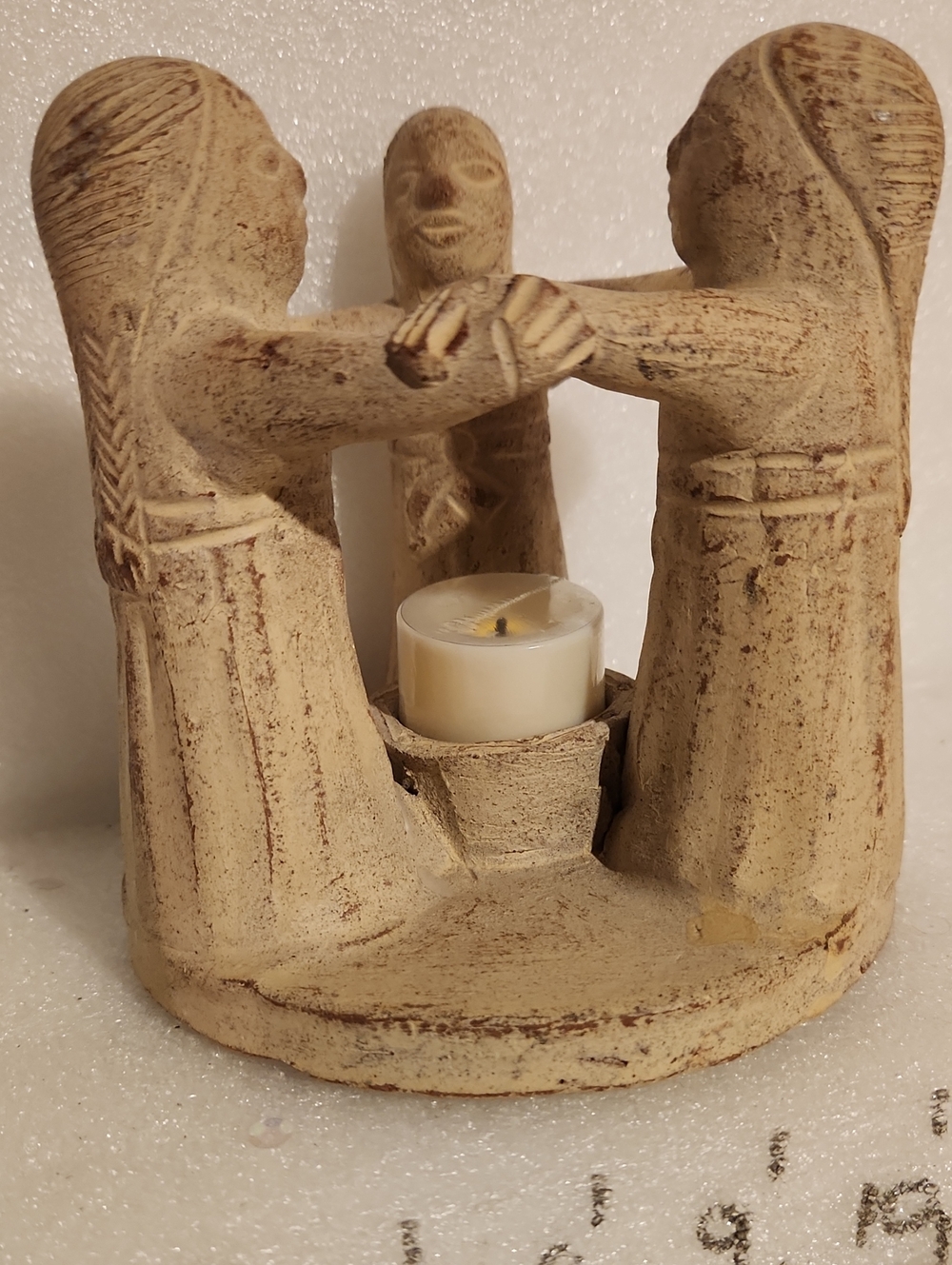 Handcrafted Beige Ceramic Candle Holder with Dancing Figures